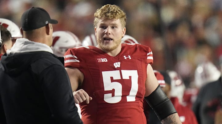 Wisconsin offensive lineman Jake Renfro (57) is shown during the fourth quarter of their game Saturday, November 18, 2023 at Camp Randall Stadium in Madison, Wisconsin. Wisconsin beat Nebraska 24-17 in overtime.