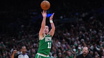 May 7, 2025; Boston, Massachusetts, USA; Boston Celtics guard Payton Pritchard (11) shoots the ball against the New York Knicks in the second half during game two of the second round for the 2025 NBA Playoffs at TD Garden. Mandatory Credit: David Butler II-Imagn Images