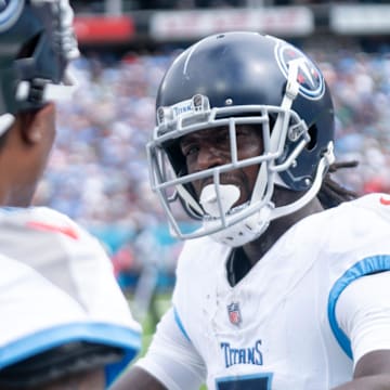 Tennessee Titans quarterback Will Levis (8), left, DeAndre Hopkins (10), center, and Calvin Ridley (0) celebrate after his first quarter touchdown against the New York Jets during their game at Nissan Stadium in Nashville, Tenn., Sunday, Sept. 15, 2024.