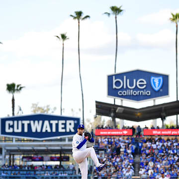 Apr 2, 2025; Los Angeles, California, USA; Los Angeles Dodgers pitcher Blake Snell (7) throws during the first inning against the Atlanta Braves at Dodger Stadium. Mandatory Credit: Gary A. Vasquez-Imagn Images