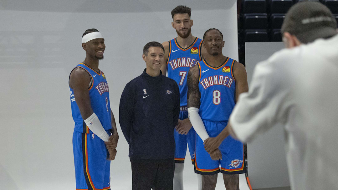 Sep 29, 2025; Oklahoma City, OK, USA; Oklahoma City Thunder guard Shai Gilgeous-Alexander (2), head coach Mark Daigneault, forward Chet Holmgren (7) and forward Jalen Williams (8) poses for a photo during the 2025 Oklahoma City Thunder media day at Paycom Center. Mandatory Credit: Alonzo Adams-Imagn Images
