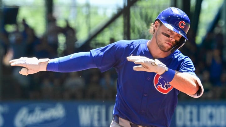 Jun 30, 2024; Milwaukee, Wisconsin, USA; Chicago Cubs second baseman Nico Hoerner (2) reacts after hitting a solo home run against the Milwaukee Brewers in the first inning  at American Family Field.