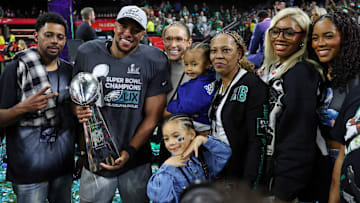Former Penn State football and current Philadelphia Eagles running back Saquon Barkley celebrates Super Bowl LIX with family