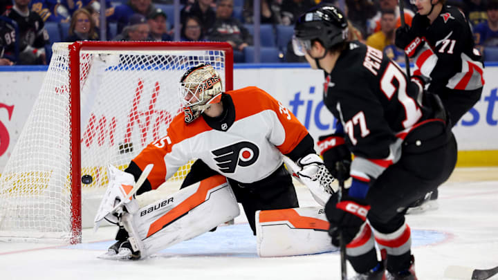 Apr 17, 2025; Buffalo, New York, USA;  Buffalo Sabres right wing JJ Peterka (77) scores a goal on Philadelphia Flyers goaltender Aleksei Kolosov (35) during the second period at KeyBank Center.