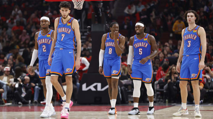  Oklahoma City Thunder guard Shai Gilgeous-Alexander (2), forward Chet Holmgren (7), forward Jalen Williams (8), guard Luguentz Dort (5) and guard Josh Giddey (3) walk on the court during the second half of a basketball game against the Chicago Bulls at United Center. Mandatory Credit: 