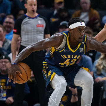 Mar 7, 2024; Indianapolis, Indiana, USA; Indiana Pacers forward Pascal Siakam (43) dribbles the ball while Minnesota Timberwolves forward Kyle Anderson (1) defends during the first half at Gainbridge Fieldhouse. Mandatory Credit: Trevor Ruszkowski-USA TODAY Sports