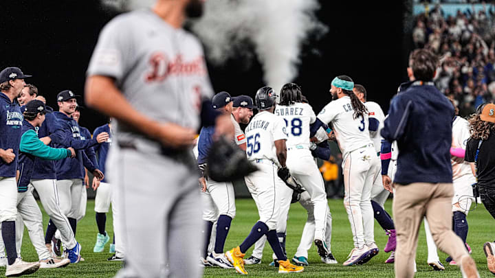 Detroit Tigers left fielder Riley Greene (31) watches Seattle Mariners players celebrate on the field as he exits after 3-2 loss to Seattle Mariners in 15 innings at ALDS Game 5 at T-Mobile Park in Seattle on Friday, Oct. 10, 2025.