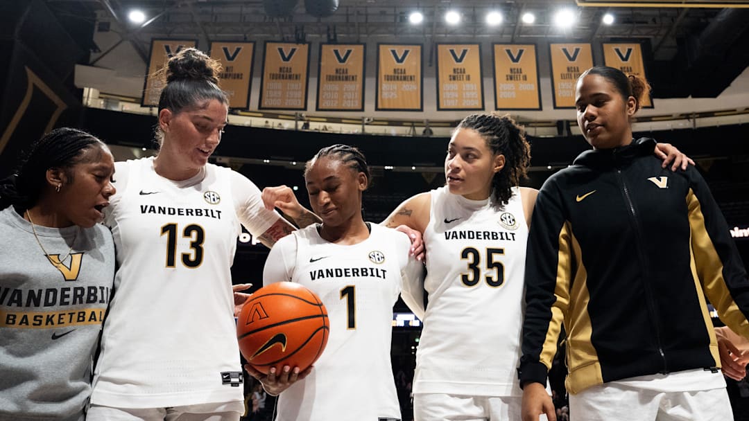 Vanderbilt Commodores guard Justine Pissott (13), Vanderbilt Commodores guard Mikayla Blakes (1) and Vanderbilt Commodores forward Sacha Washington (35) stand together after the women’s basketball game between the Vanderbilt Commodores and Virginia Cavaliers at Vanderbilt's Memorial Gymnasium in Nashville on Wednesday, Dec. 3, 2025.