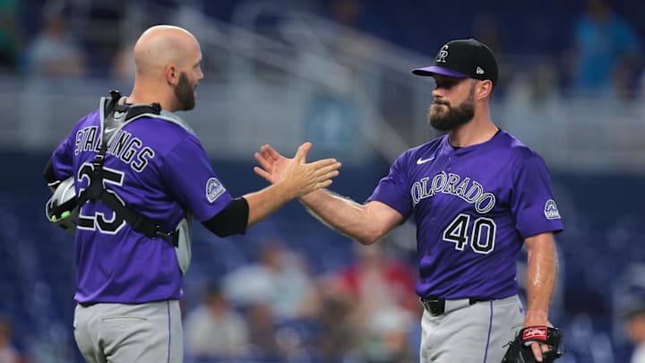 Pitcher Tyler Kinley and catcher Jacob Stallings celebrate a Rockies win. Pitcher Tyler Kinley and catcher Jacob Stallings celebrate a Rockies win.