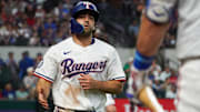 Texas Rangers shortstop Josh Smith (8) heads the for the dugout after scoring during the first inning against the Arizona Diamondbacks at Globe Life Field. 