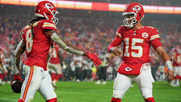 Nov 4, 2024; Kansas City, Missouri, USA; Kansas City Chiefs wide receiver DeAndre Hopkins (8) celebrates with quarterback Patrick Mahomes (15) after scoring against the Tampa Bay Buccaneers during the second half at GEHA Field at Arrowhead Stadium. Mandatory Credit: Denny Medley-Imagn Images