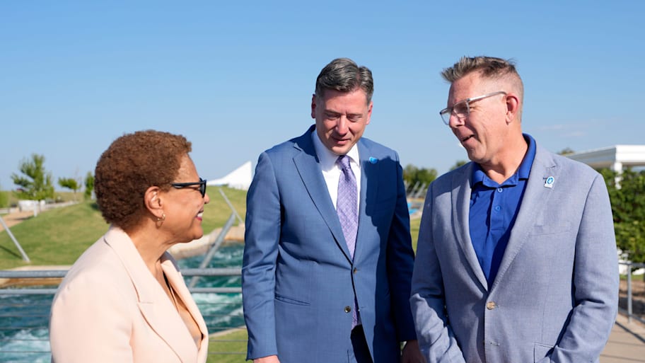 David Holt and Mike Knopp with Los Angelos mayor Karen Bass at Riversport OKC.