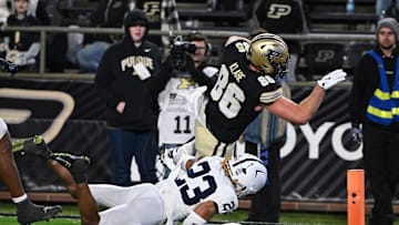 Nov 16, 2024; West Lafayette, Indiana, USA; Penn State Nittany Lions cornerback Antoine Belgrave-Shorter (23) tackles Purdue Boilermakers tight end Max Klare (86) in the end zone for a touchdown during the second half at Ross-Ade Stadium. Mandatory Credit: Marc Lebryk-Imagn Images