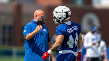 Giants head coach Brian Daboll, running back Cam Skattebo