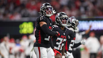 Sep 22, 2024; Atlanta, Georgia, USA; Atlanta Falcons safety Justin Simmons (31) celebrates after an interception against the Kansas City Chiefs in the first quarter at Mercedes-Benz Stadium. Mandatory Credit: Brett Davis-Imagn Images