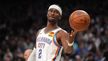 Nov 7, 2025; Sacramento, California, USA; Oklahoma City Thunder guard Shai Gilgeous-Alexander (2) flips the ball to an official after a play against the Sacramento Kings in the second quarter at the Golden 1 Center. Mandatory Credit: Cary Edmondson-Imagn Images