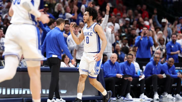 Mar 31, 2024; Dallas, TX, USA; Duke Blue Devils guard Jared McCain (0) reacts in the first half against the North Carolina State Wolfpack in the finals of the South Regional of the 2024 NCAA Tournament at American Airline Center. Mandatory Credit: Kevin Jairaj-USA TODAY Sports