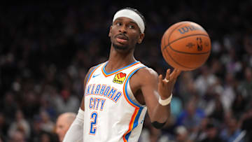 Nov 7, 2025; Sacramento, California, USA; Oklahoma City Thunder guard Shai Gilgeous-Alexander (2) flips the ball to an official after a play against the Sacramento Kings in the second quarter at the Golden 1 Center. Mandatory Credit: Cary Edmondson-Imagn Images