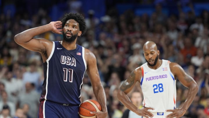 Aug 3, 2024; Villeneuve-d'Ascq, France; United States center Joel Embiid (11) gestures to the crowd in the fourth quarter against Puerto Rico during the Paris 2024 Olympic Summer Games at Stade Pierre-Mauroy. 