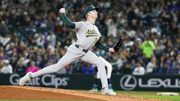 Mar 29, 2025; Seattle, Washington, USA; Athletics pitcher Noah Murdock (58) throws against the Seattle Mariners during the sixth inning at T-Mobile Park. Mandatory Credit: Joe Nicholson-Imagn Images
