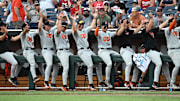 Jun 17, 2025; Omaha, Neb, USA;  The Oregon State Beavers bench cheer action against the Louisville Cardinals during the eighth inning at Charles Schwab Field. Mandatory Credit: Steven Branscombe-Imagn Images