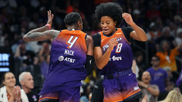 Mercury forward Natasha Mack (4) celebrates her steal with teammate Monique Akoa Makani (8) against the New York Liberty at PHX Arena, Aug. 30, 2025, in Phoenix. Mercury forward Natasha Mack (4) celebrates her steal with teammate Monique Akoa Makani (8) against the New York Liberty at PHX Arena, Aug. 30, 2025, in Phoenix.
