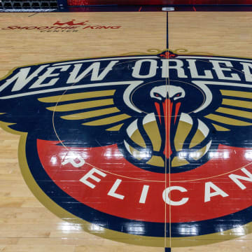 Apr 12, 2023; New Orleans, Louisiana, USA; Detailed view of the New Orleans Pelicans logo at mid court before the Play-In game against the Oklahoma City Thunder at Smoothie King Center. Mandatory Credit: Stephen Lew-USA TODAY Sports