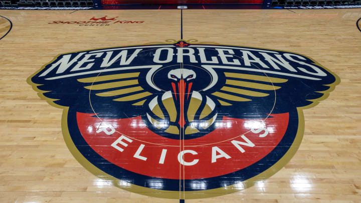 Apr 12, 2023; New Orleans, Louisiana, USA; Detailed view of the New Orleans Pelicans logo at mid court before the Play-In game against the Oklahoma City Thunder at Smoothie King Center. Mandatory Credit: Stephen Lew-USA TODAY Sports