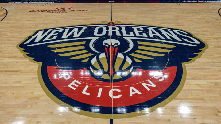 Apr 12, 2023; New Orleans, Louisiana, USA; Detailed view of the New Orleans Pelicans logo at mid court before the Play-In game against the Oklahoma City Thunder at Smoothie King Center.