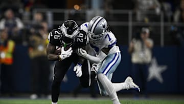 Dec 24, 2022; Arlington, Texas, USA; Philadelphia Eagles running back Miles Sanders (26) and Dallas Cowboys cornerback Trevon Diggs (7) in action during the game between the Dallas Cowboys and the Philadelphia Eagles at AT&T Stadium. Mandatory Credit: Jerome Miron-Imagn Images