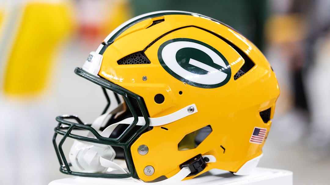 Oct 19, 2025; Glendale, Arizona, USA; Detailed view of a Green Bay Packers helmet at State Farm Stadium. Mandatory Credit: Mark J. Rebilas-Imagn Images Oct 19, 2025; Glendale, Arizona, USA; Detailed view of a Green Bay Packers helmet at State Farm Stadium. Mandatory Credit: Mark J. Rebilas-Imagn Images