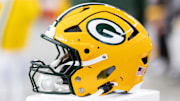 Oct 19, 2025; Glendale, Arizona, USA; Detailed view of a Green Bay Packers helmet at State Farm Stadium. Mandatory Credit: Mark J. Rebilas-Imagn Images