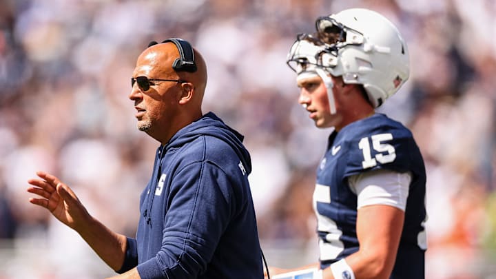 Head coach James Franklin of the Penn State Nittany Lions and Drew Allar #15 look on against the Bowling Green Falcons during the second half at Beaver Stadium on September 7, 2024 in State College, Pennsylvania.