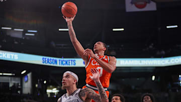 Mar 4, 2025; Atlanta, Georgia, USA; Miami Hurricanes guard Matthew Cleveland (0) shoots against the Georgia Tech Yellow Jackets in the first half at McCamish Pavilion. Mandatory Credit: Brett Davis-Imagn Images
