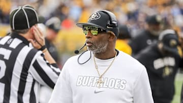 Nov 8, 2025; Morgantown, West Virginia, USA; Colorado Buffaloes head coach Deion Sanders walks along the sidelines late in the fourth quarter against the West Virginia Mountaineers at Milan Puskar Stadium. Mandatory Credit: Ben Queen-Imagn Images