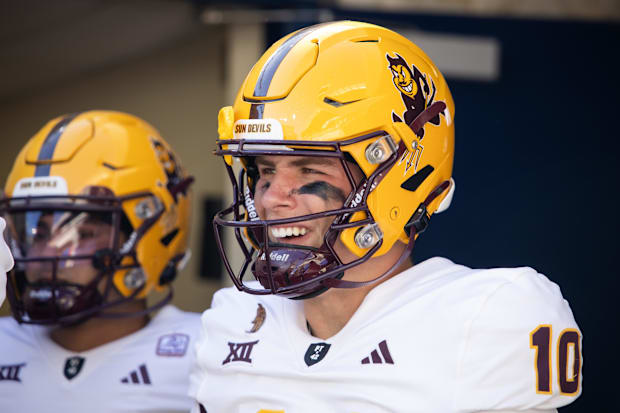 A close-up shot of Sam Leavitt in a football helmet.