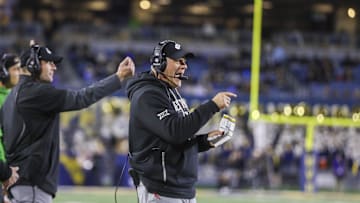 Oct 25, 2025; Morgantown, West Virginia, USA; West Virginia Mountaineers head coach Rich Rodriguez calls out a play during the third quarter against the Texas Christian University Horned Frogs at Milan Puskar Stadium. Mandatory Credit: Ben Queen-Imagn Images