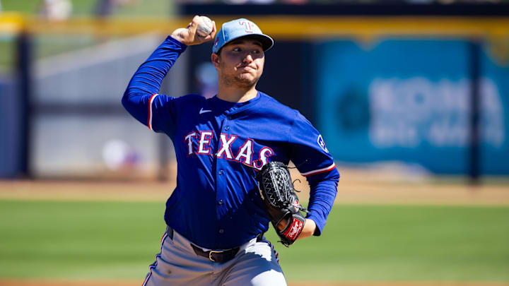 Mar 5, 2024; Peoria, Arizona, USA; Texas Rangers pitcher Owen White against the Seattle Mariners during a spring training baseball game at Peoria Sports Complex. 