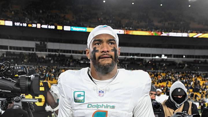 Dec 15, 2025; Pittsburgh, Pennsylvania, USA; Miami Dolphins quarterback Tua Tagovailoa (1) leaves the  field following a game against the Pittsburgh Steelers at Acrisure Stadium. Mandatory Credit: Barry Reeger-Imagn Images