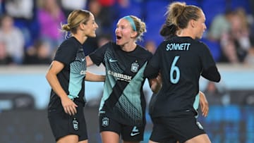 NJ/NY Gotham FC forward Esther Gonzalez (9) celebrates with midfielder Jenna Nighswonger (2) and midfielder Emily Sonnett (6)  
