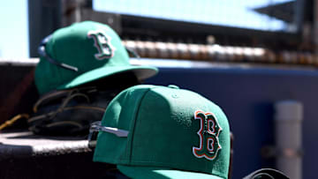 Mar 17, 2025; North Port, Florida, USA; Boston Red Sox hats on the stairs to the dugout before the start of the game  between  the Atlanta Braves and Boston Red Sox  during spring training at CoolToday Park. Mandatory Credit: Jonathan Dyer-Imagn Images