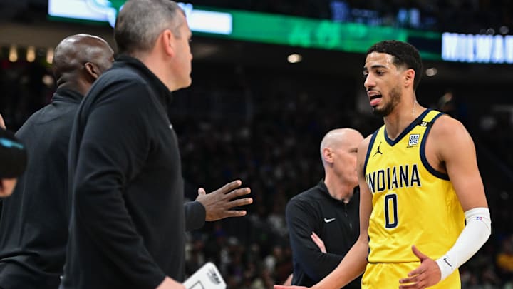 Apr 21, 2024; Milwaukee, Wisconsin, USA;Indiana Pacers guard Tyrese Haliburton (0) reacts during a timeout in the fourth quarter against the Milwaukee Bucks during game one of the first round for the 2024 NBA playoffs at Fiserv Forum. Mandatory Credit: Benny Sieu-USA TODAY Sports