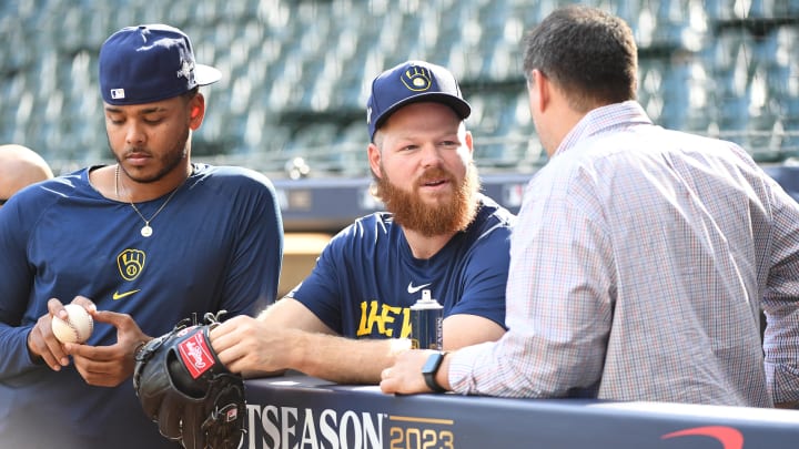 Oct 3, 2023; Milwaukee, Wisconsin, USA; Milwaukee Brewers starting pitcher Brandon Woodruff (53), who recently was ruled out for the Wildcard series is seen out front of the dug out before their game against the Arizona Diamondbacks during game one of the Wildcard series for the 2023 MLB playoffs at American Family Field. Mandatory Credit: Michael McLoone-USA TODAY Sports