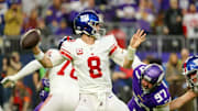 Jan 15, 2023; Minneapolis, Minnesota, USA; New York Giants quarterback Daniel Jones (8) passes the ball against the Minnesota Vikings during the first quarter of a wild card game at U.S. Bank Stadium. Mandatory Credit: Matt Krohn-Imagn Images