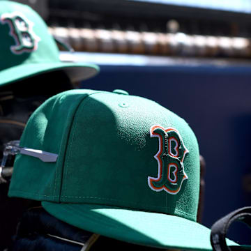 Mar 17, 2025; North Port, Florida, USA; Boston Red Sox hats on the stairs to the dugout before the start of the game  between  the Atlanta Braves and Boston Red Sox  during spring training at CoolToday Park. Mandatory Credit: Jonathan Dyer-Imagn Images