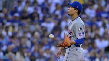 Oct 13, 2024; Los Angeles, California, USA; New York Mets pitcher Kodai Senga (34) reacts against the Los Angeles Dodgers during the first inning in game one of the NLCS for the 2024 MLB Playoffs at Dodger Stadium. Mandatory Credit: Jayne Kamin-Oncea-Imagn Images