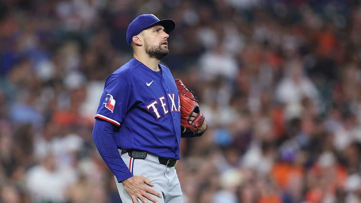Jul 31, 2026; Houston, Texas, USA; Texas Rangers starting pitcher Nathan Eovaldi (17) reacts after a play during the second inning against the Houston Astros at Daikin Park. Mandatory Credit: Troy Taormina-Imagn Images