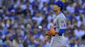 Oct 13, 2024; Los Angeles, California, USA; New York Mets pitcher Kodai Senga (34) reacts against the Los Angeles Dodgers during the first inning in game one of the NLCS for the 2024 MLB Playoffs at Dodger Stadium. Mandatory Credit: Jayne Kamin-Oncea-Imagn Images