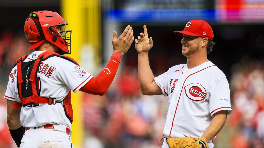 Mar 29, 2026; Cincinnati, Ohio, USA; Cincinnati Reds relief pitcher Emilio Pagan (15) reacts with catcher Tyler Stephenson (37) after the victory over the Boston Red Sox at Great American Ball Park. Mandatory Credit: Katie Stratman-Imagn Images