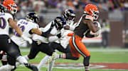 Nov 16, 2025; Cleveland, Ohio, USA; Cleveland Browns running back Quinshon Judkins (10) runs for a gain during the first quarter against the Baltimore Ravens at Huntington Bank Field. Mandatory Credit: Scott Galvin-Imagn Images